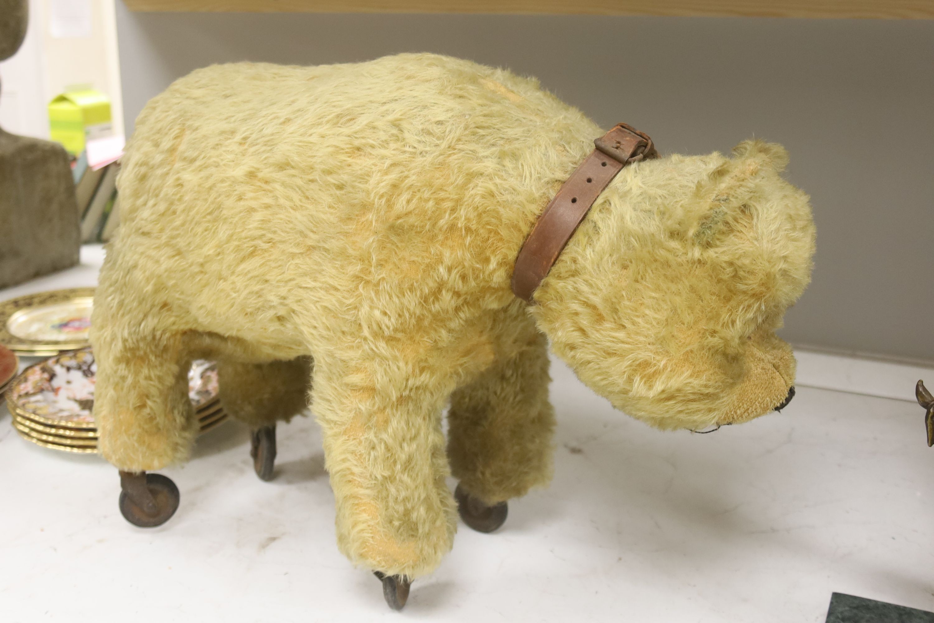 A blonde plush bear on wheels (put on later) 55cm